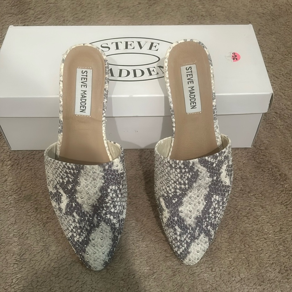 White and grey snakeskin mules with studs
